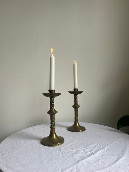 Pair of vintage tall brass candle sticks