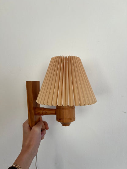 PAIR OF PINE WALL LIGHTS WITH PEACH PLEATED SHADES