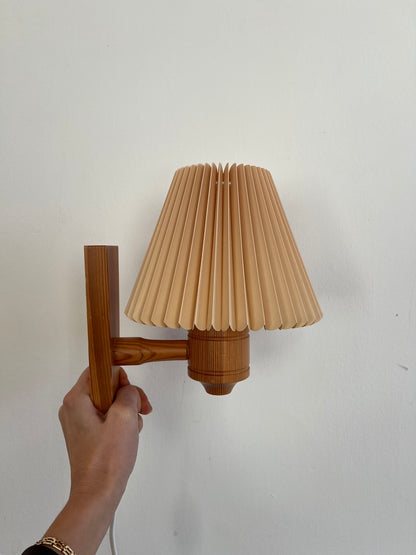 PAIR OF PINE WALL LIGHTS WITH PEACH PLEATED SHADES