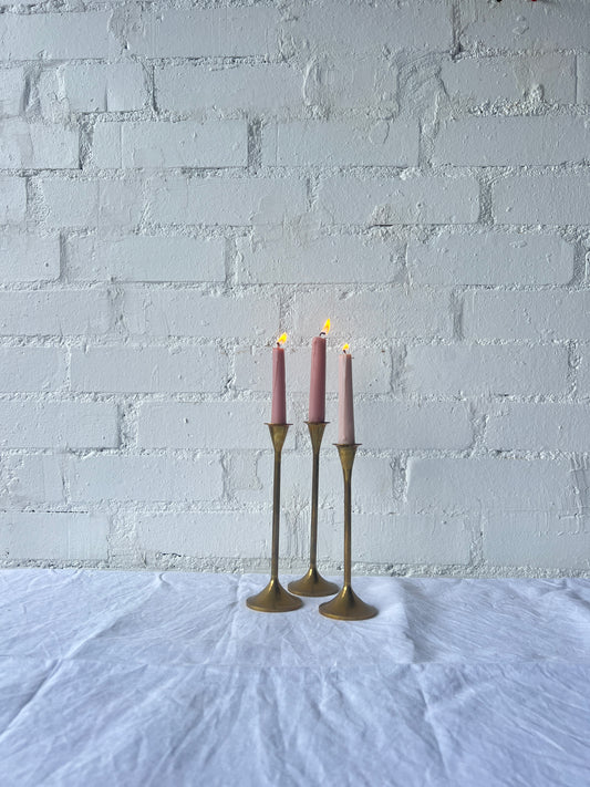 TRIO OF BRASS CANDLE HOLDERS