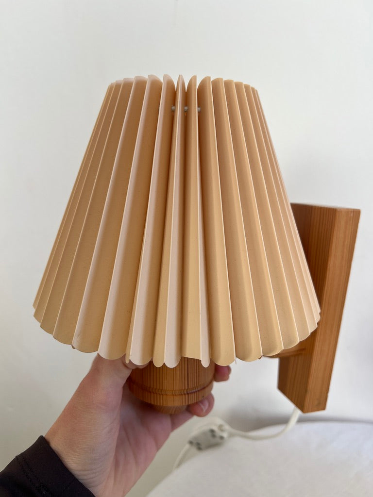 PAIR OF PINE WALL LIGHTS WITH PEACH PLEATED SHADES