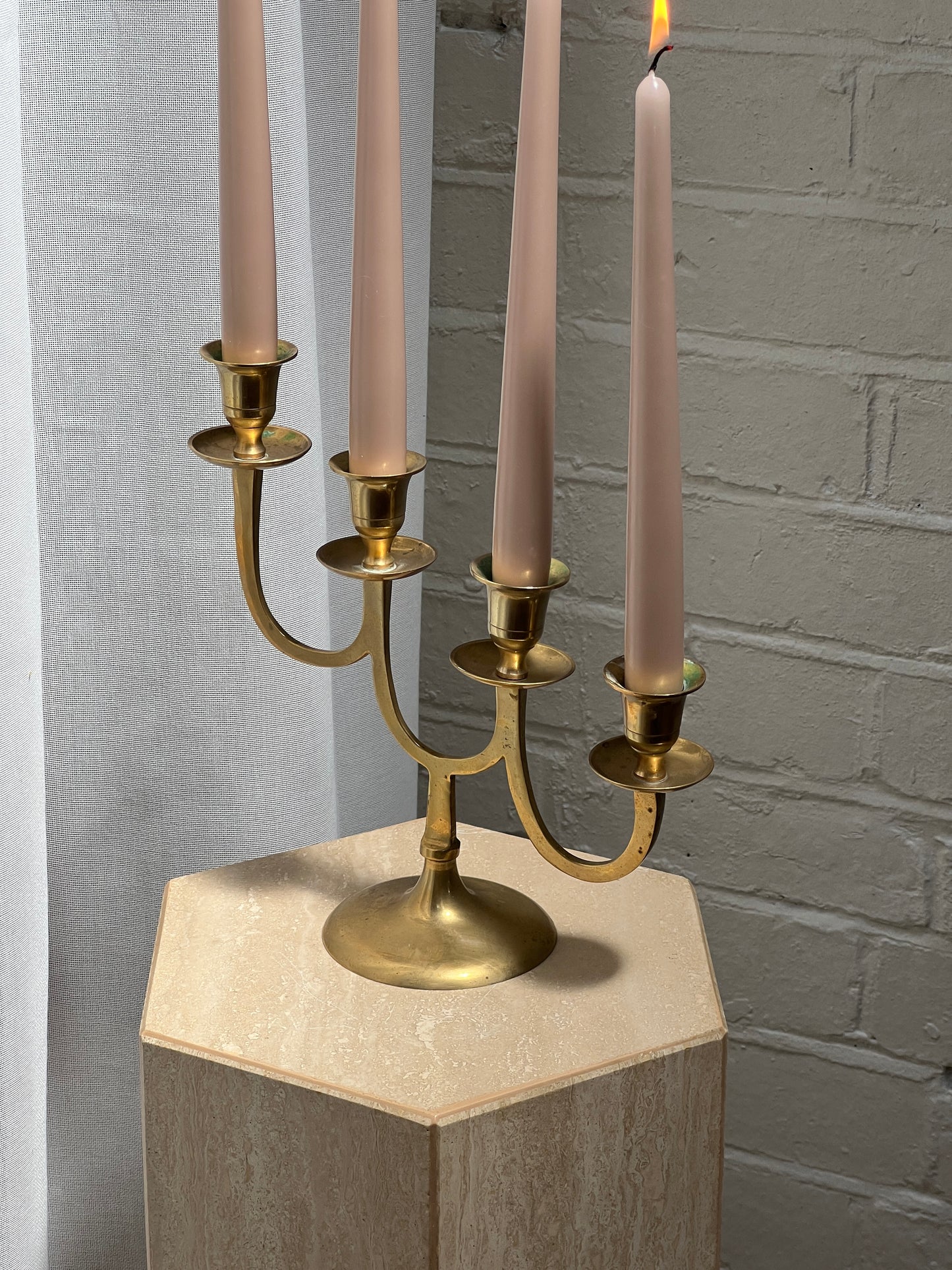 STAGGERED BRASS CANDLE HOLDER