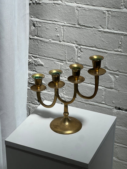 STAGGERED BRASS CANDLE HOLDER