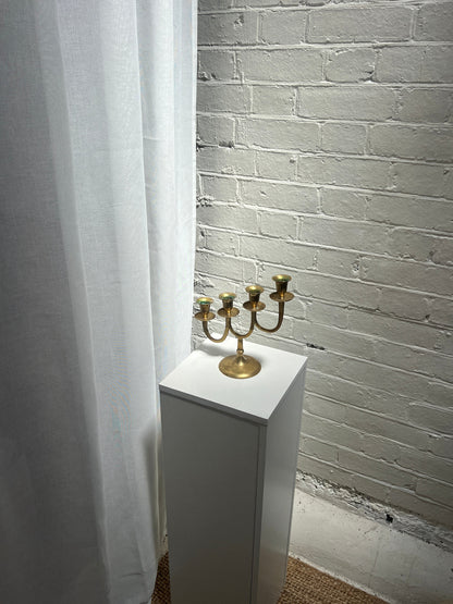 STAGGERED BRASS CANDLE HOLDER