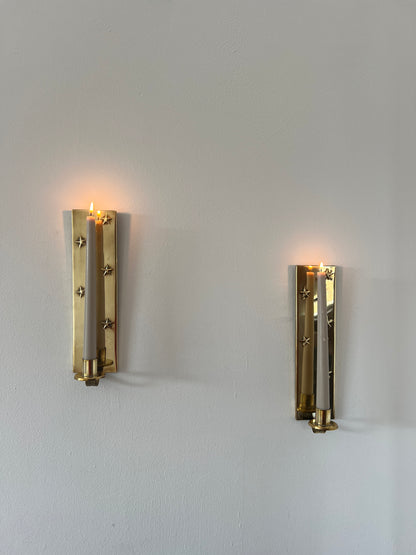 Pair of brass star sconces