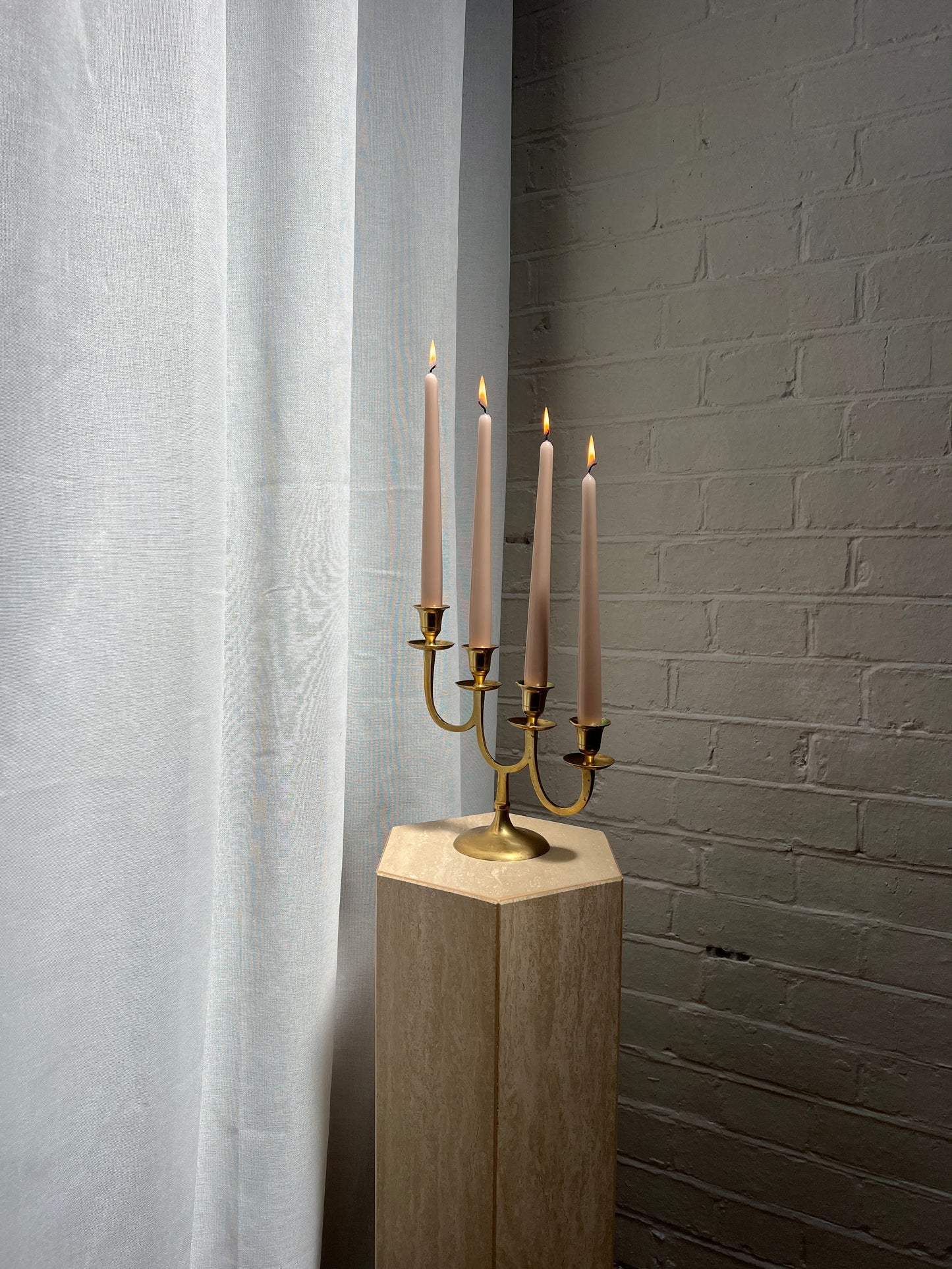 STAGGERED BRASS CANDLE HOLDER