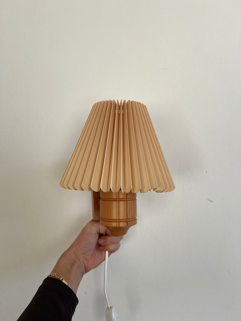 PAIR OF PINE WALL LIGHTS WITH PEACH PLEATED SHADES