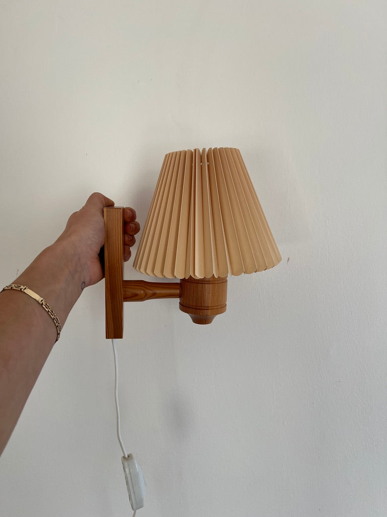 PAIR OF PINE WALL LIGHTS WITH PEACH PLEATED SHADES