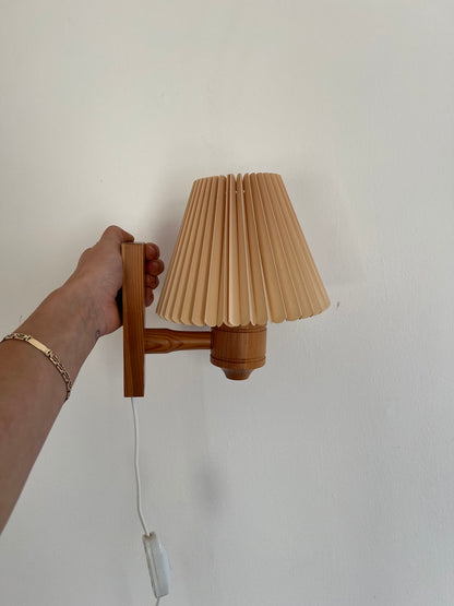 PAIR OF PINE WALL LIGHTS WITH PEACH PLEATED SHADES