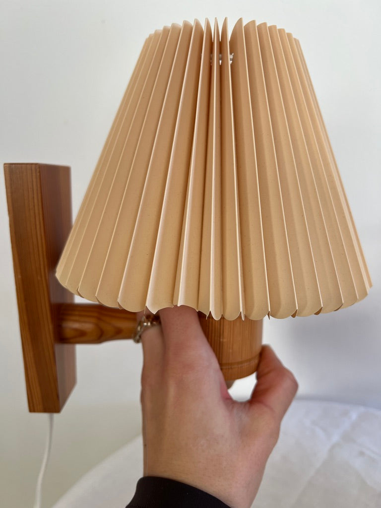 PAIR OF PINE WALL LIGHTS WITH PEACH PLEATED SHADES