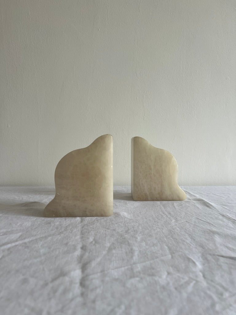 Pair of marble white 'cloud' book ends