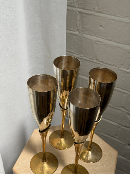 SET OF FOUR BRASS & CHROME FLUTES