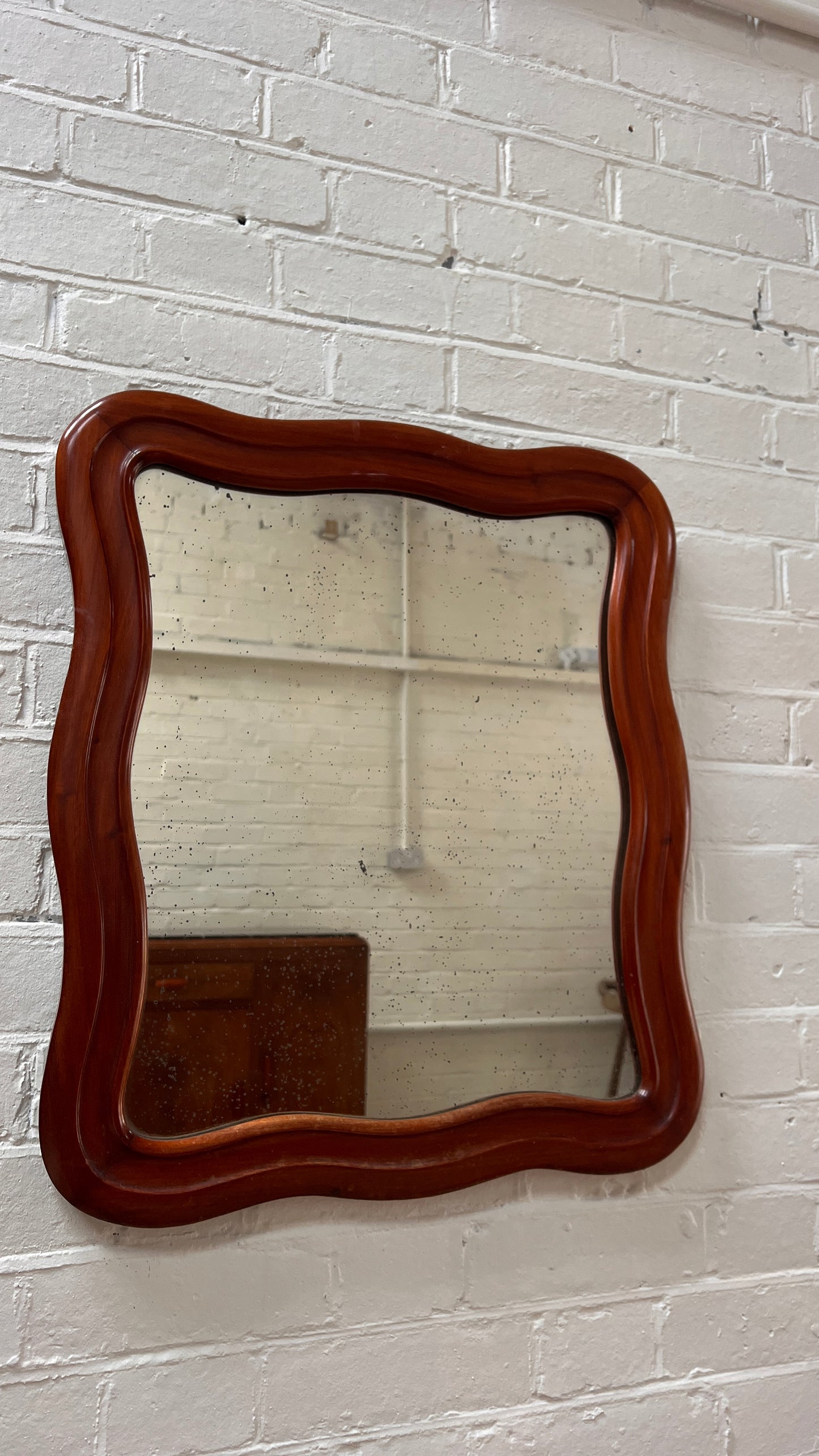 FOXED WOODEN WAVY MIRROR