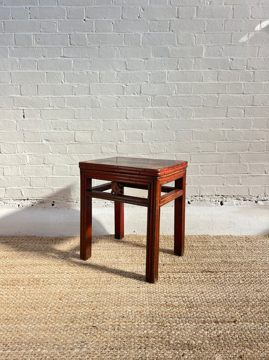 RED REEDED SIDE TABLE