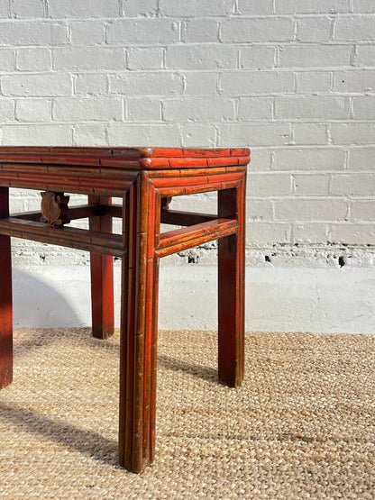 RED REEDED SIDE TABLE