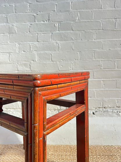 RED REEDED SIDE TABLE