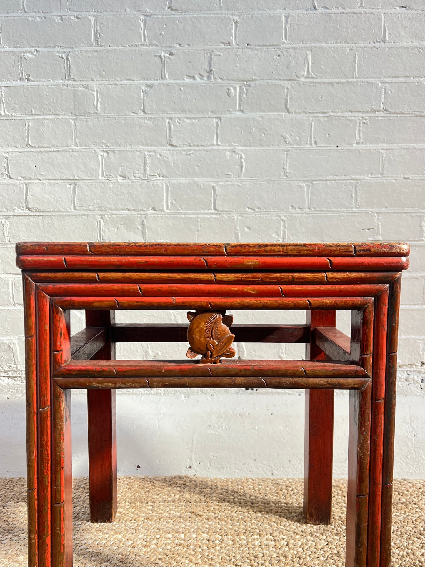 RED REEDED SIDE TABLE