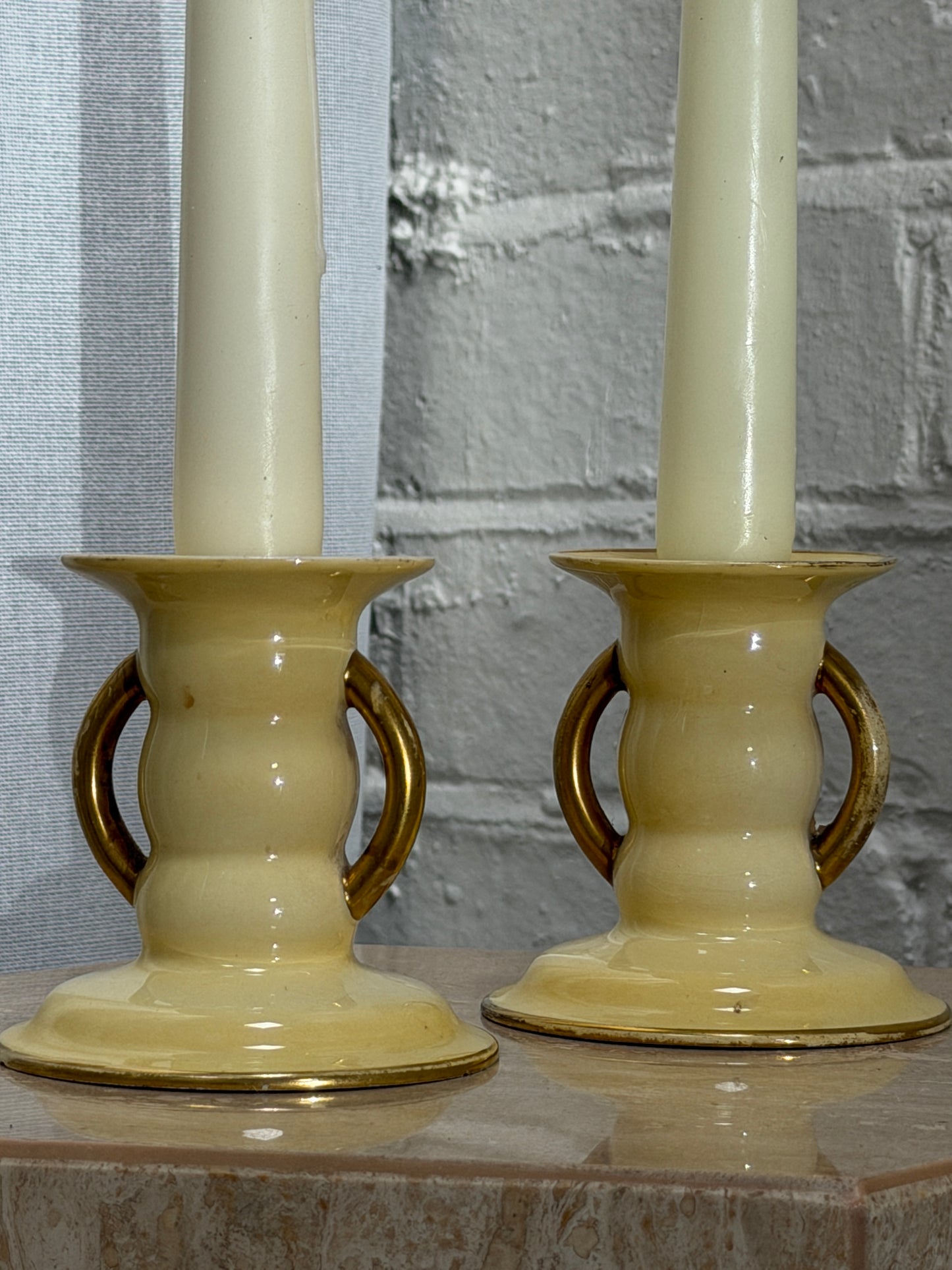 PAIR OF YELLOW CANDLE HOLDERS