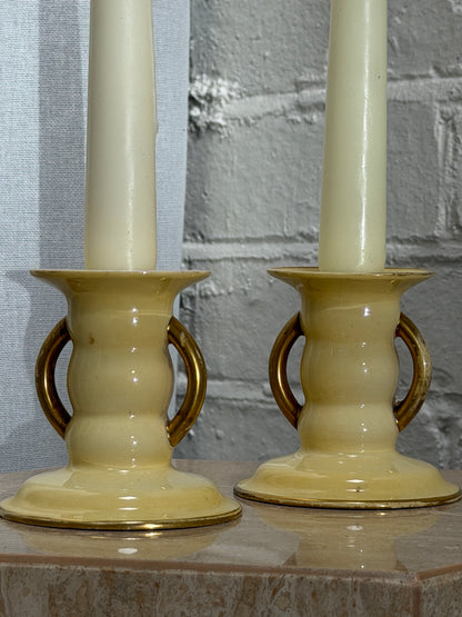 PAIR OF YELLOW CANDLE HOLDERS