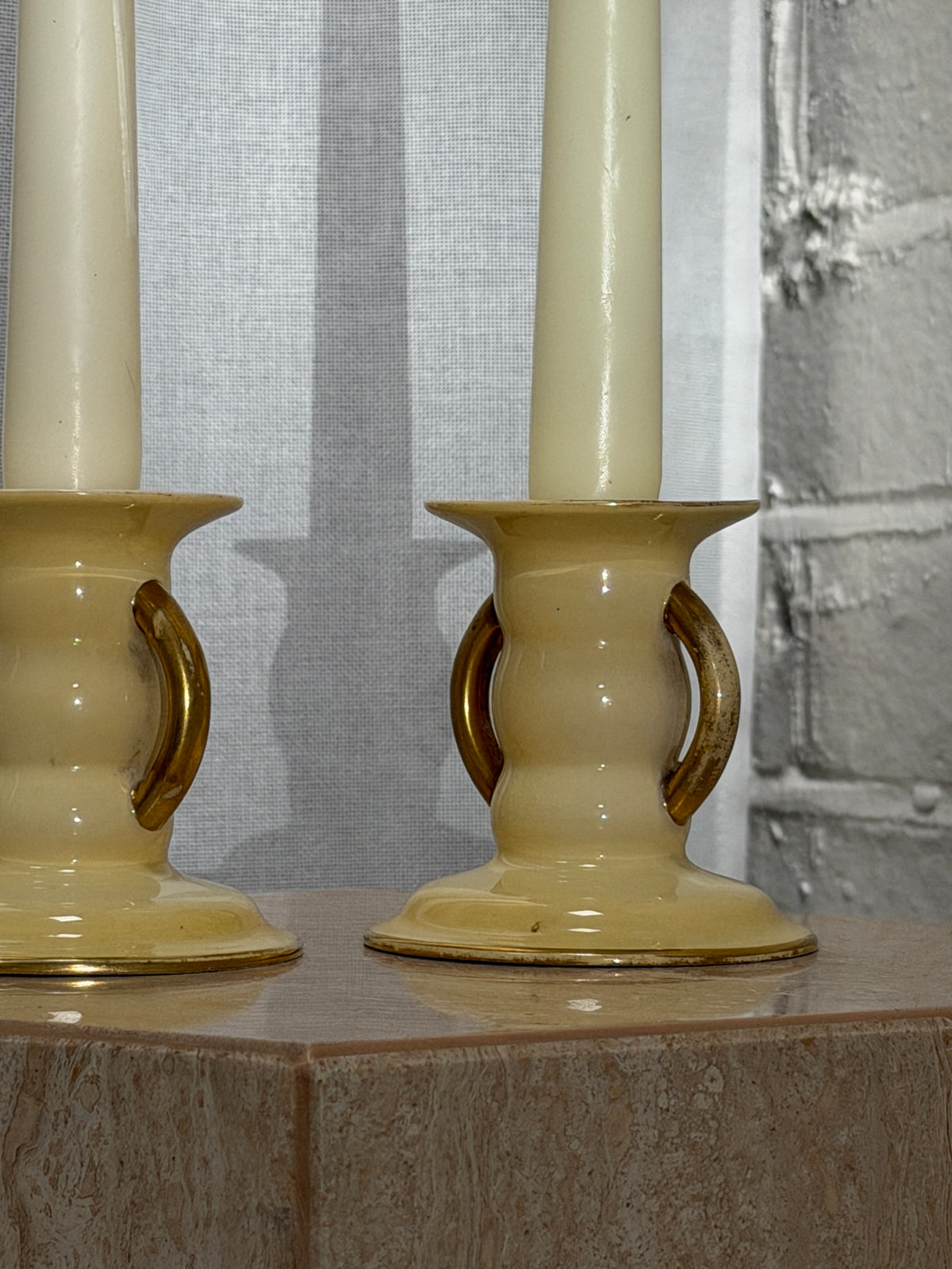 PAIR OF YELLOW CANDLE HOLDERS