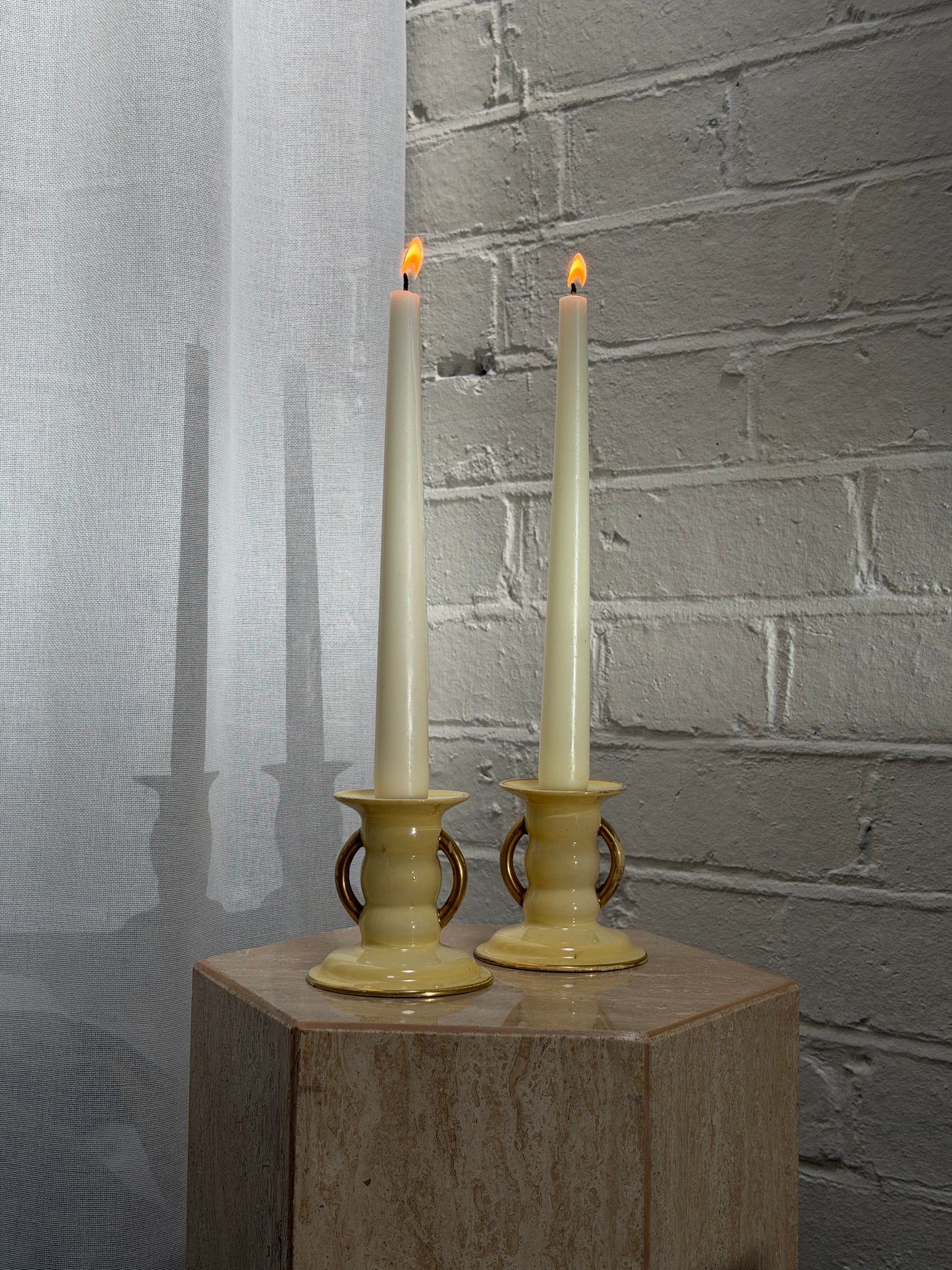 PAIR OF YELLOW CANDLE HOLDERS