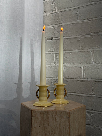 PAIR OF YELLOW CANDLE HOLDERS