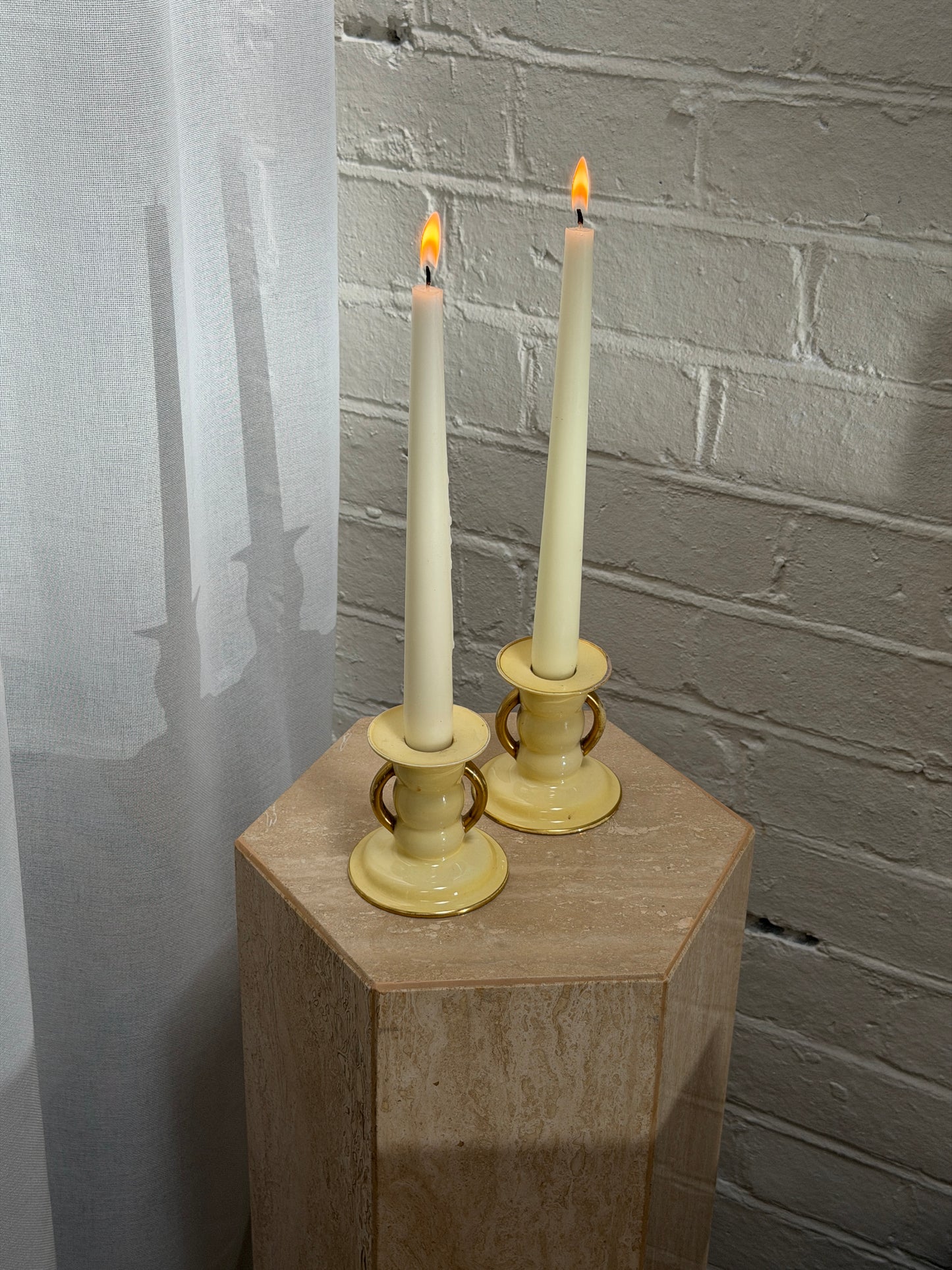 PAIR OF YELLOW CANDLE HOLDERS