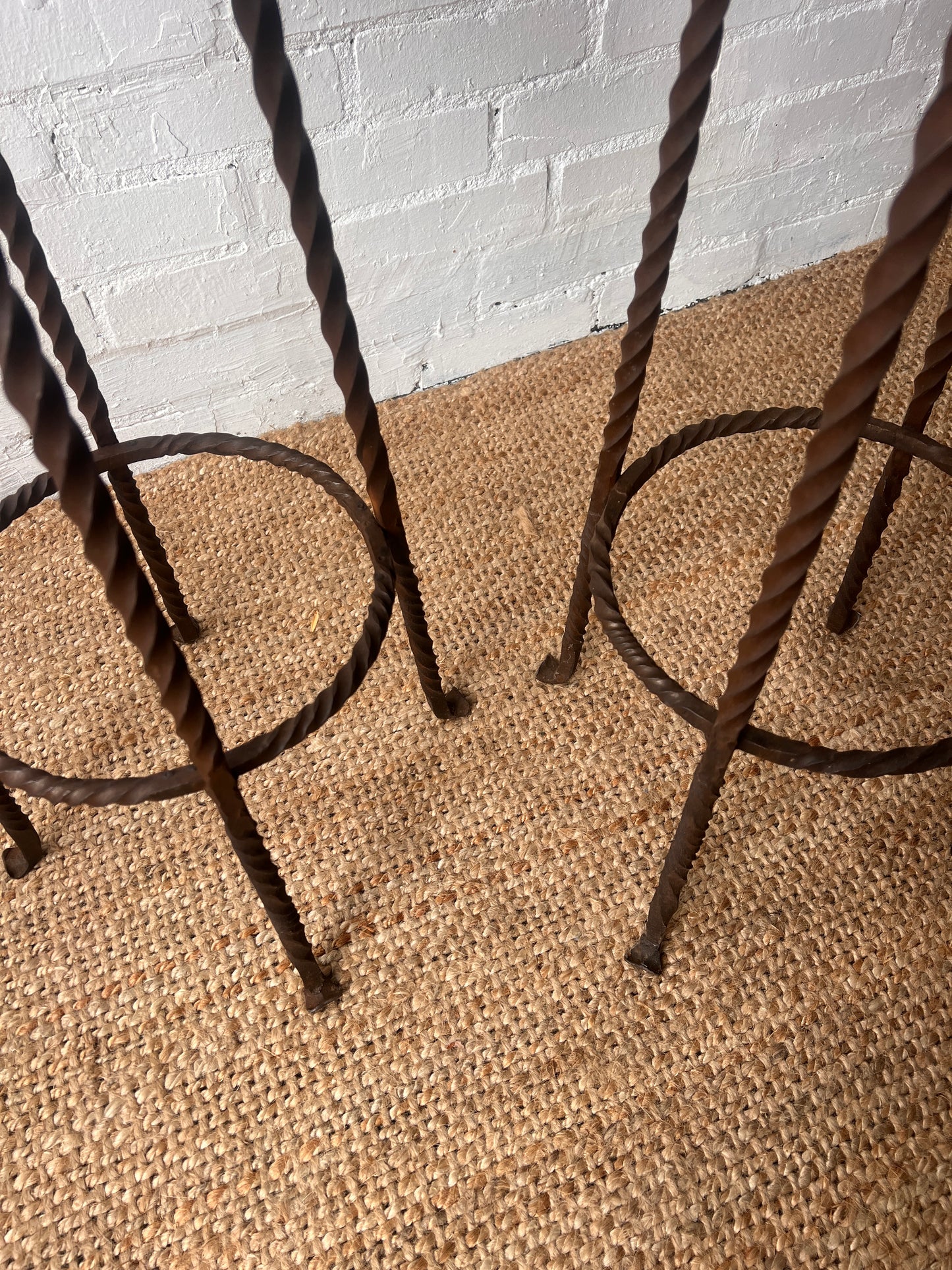 PAIR OF BRUTALIST WROUGHT IRON BAR STOOLS