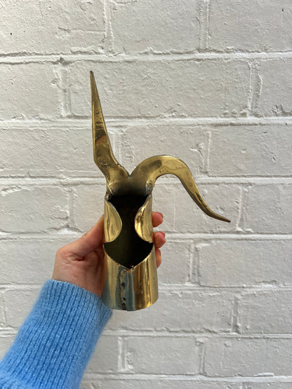 THREE BRASS ORNAMENTS