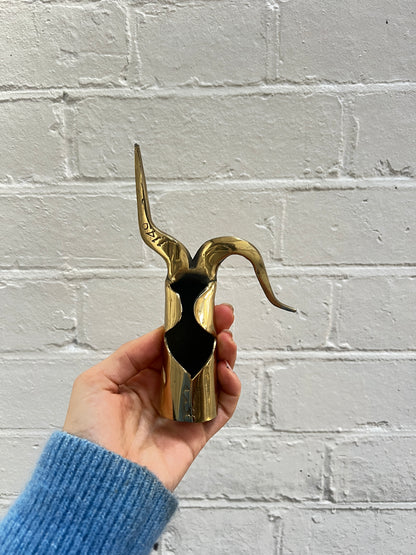 THREE BRASS ORNAMENTS