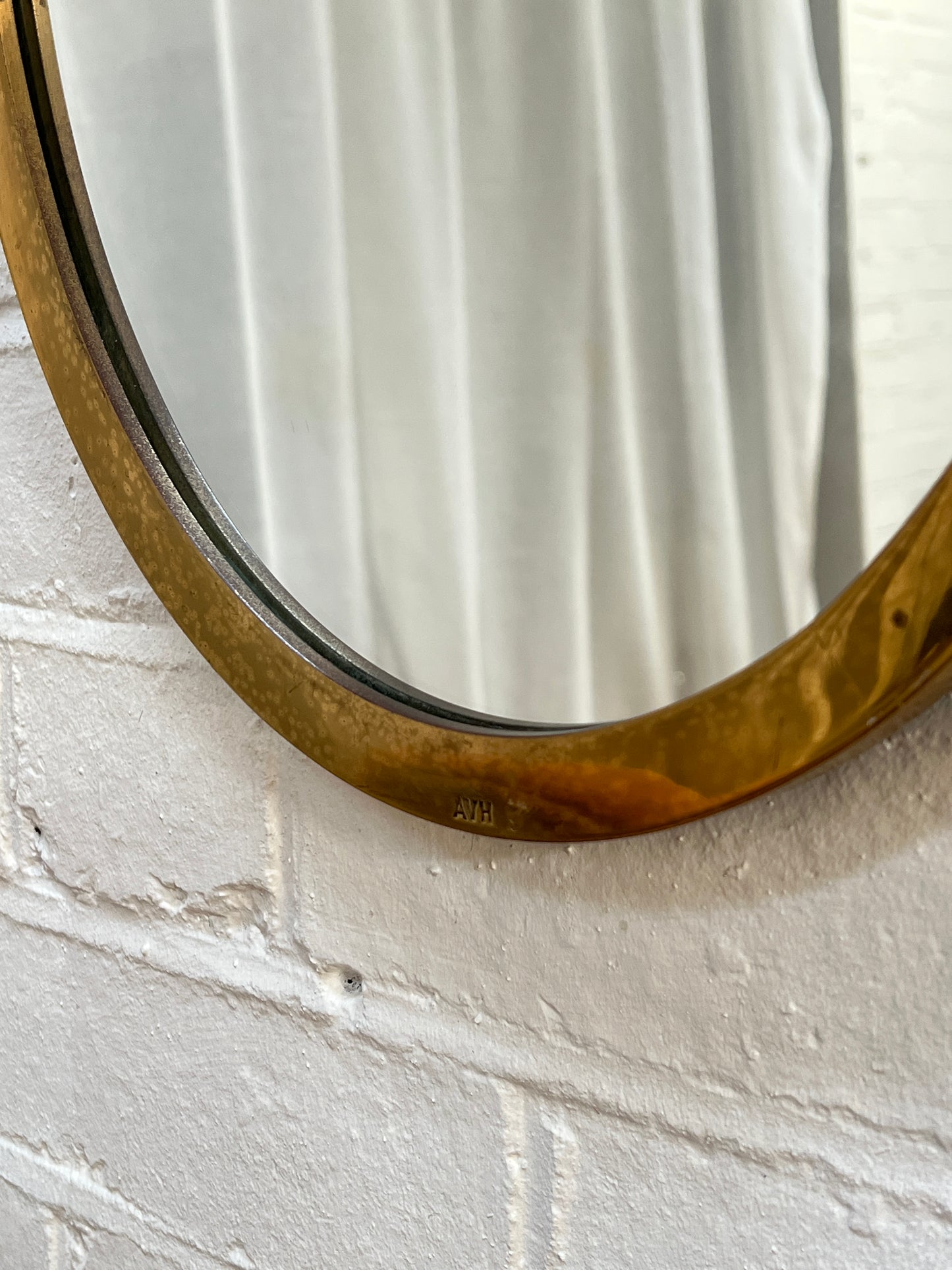 SMALL BRASS OVAL MIRROR