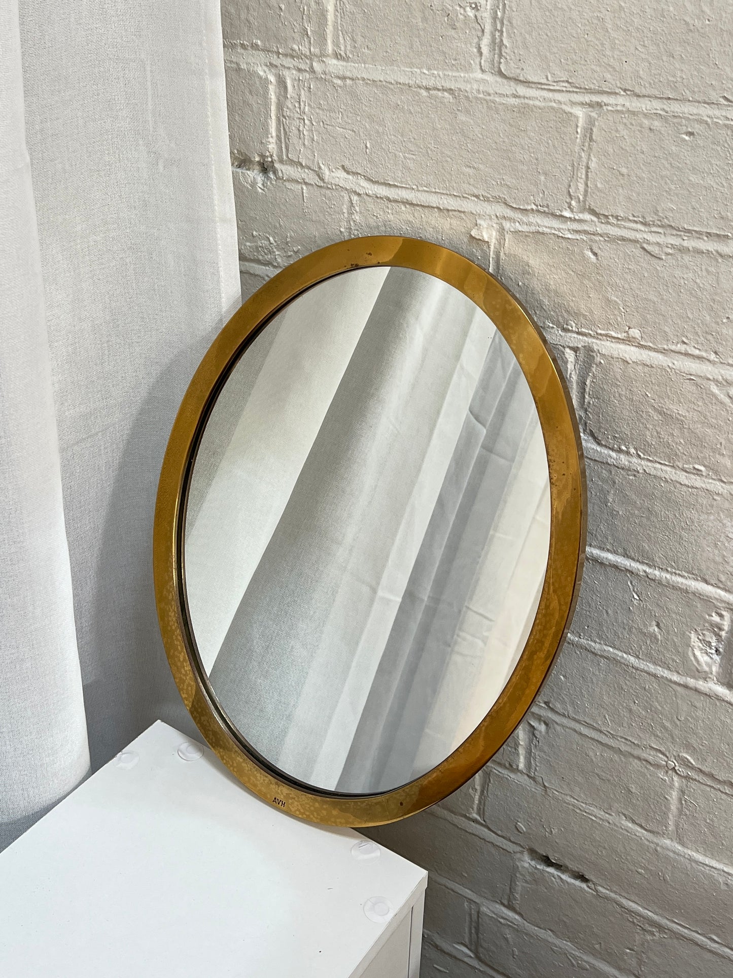 SMALL BRASS OVAL MIRROR