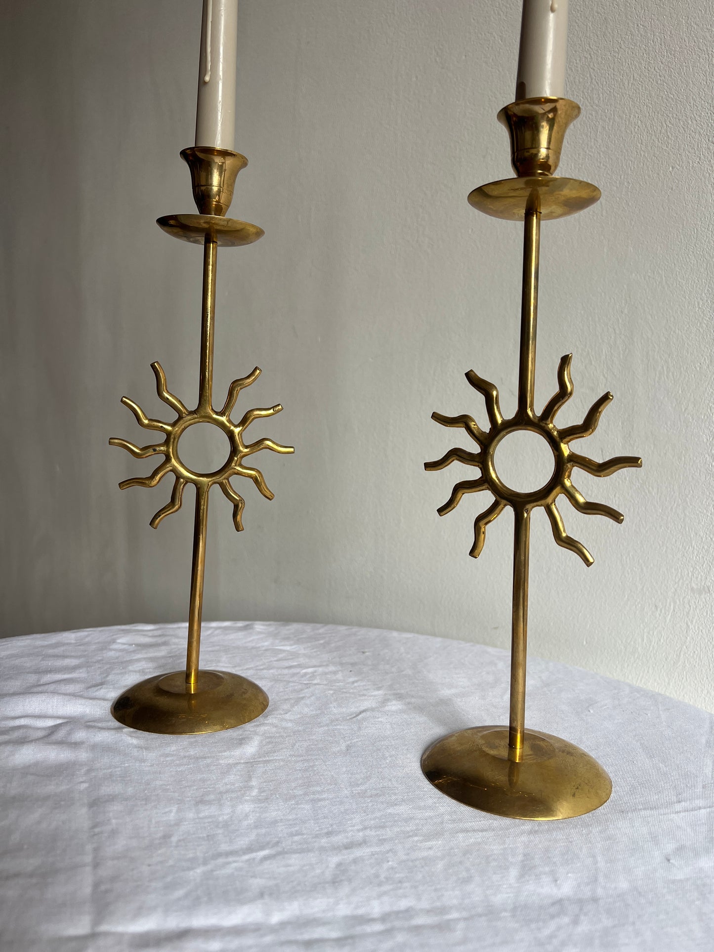 PAIR OF BRASS SUN CANDLE HOLDERS