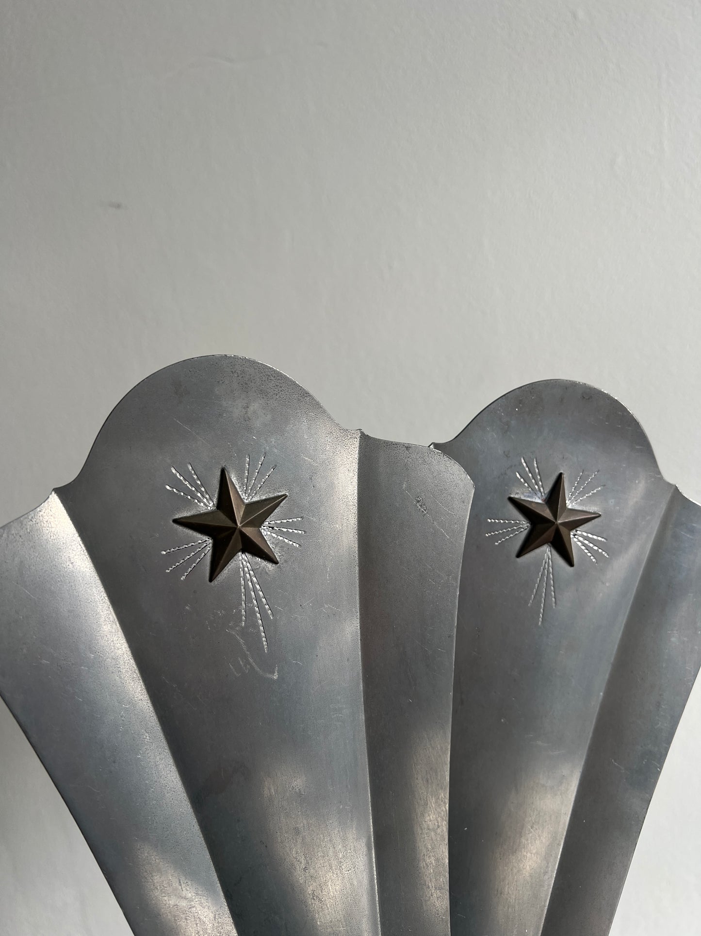 PAIR OF SILVER STAR SCONCES