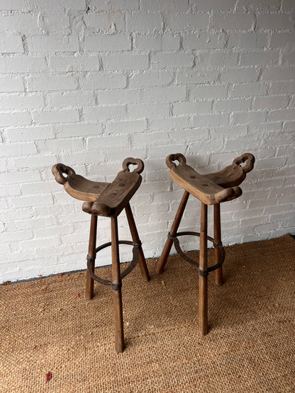 PAIR OF BRUTALIST SADDLE WOODEN STOOLS