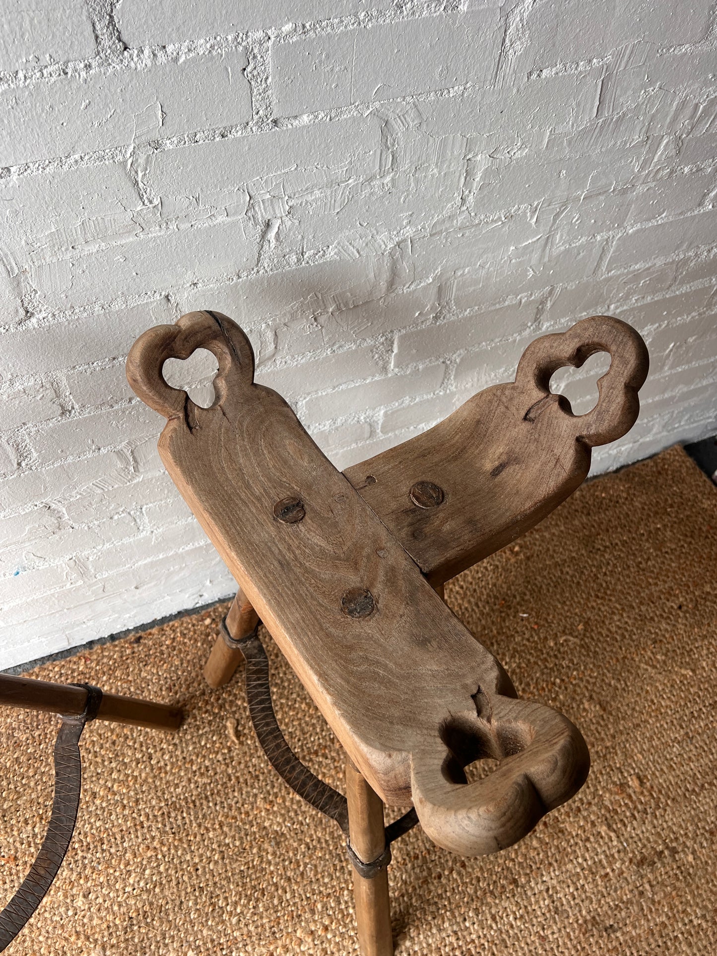 PAIR OF BRUTALIST SADDLE WOODEN STOOLS