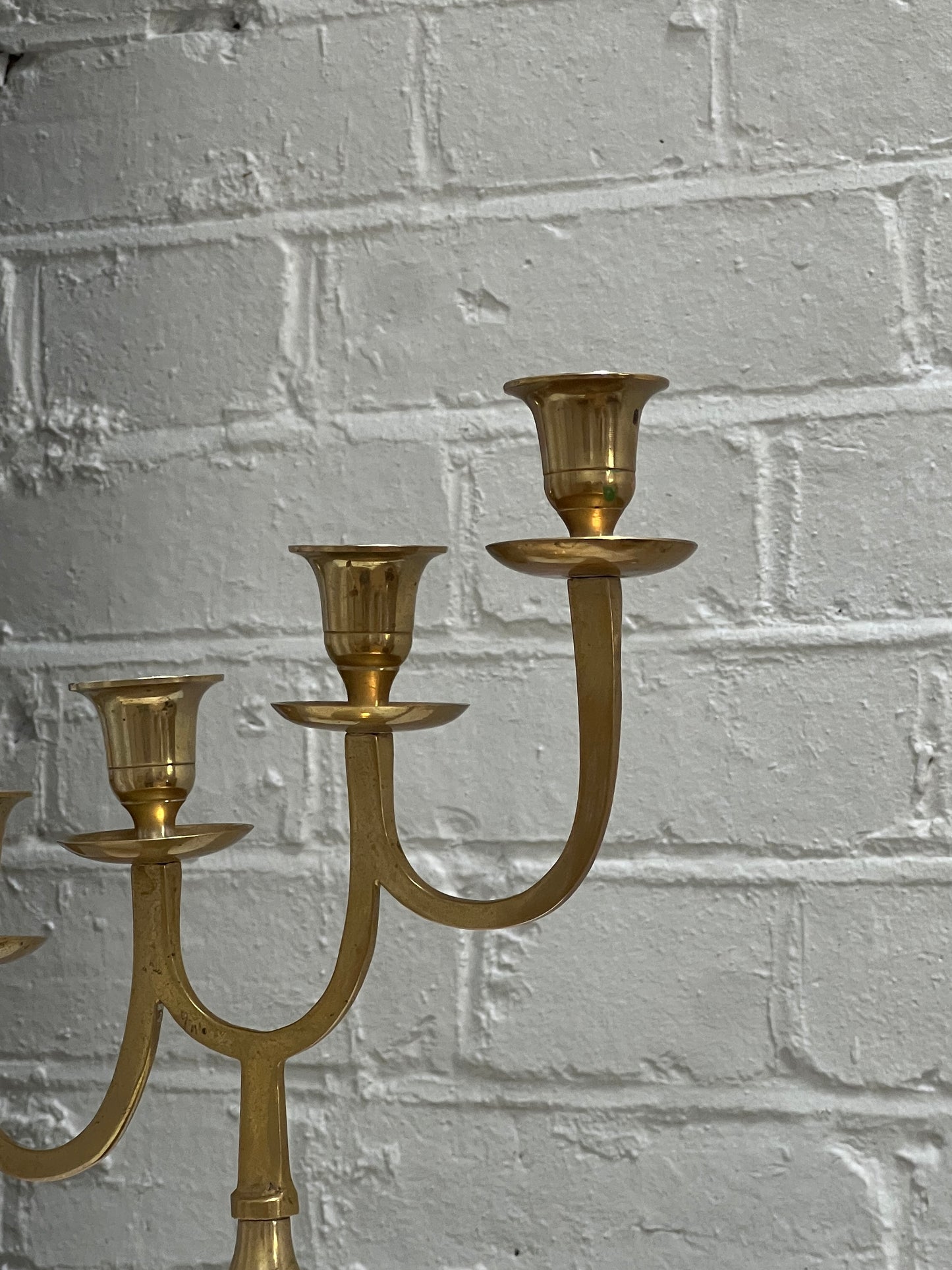 STAGGERED BRASS CANDLE HOLDER