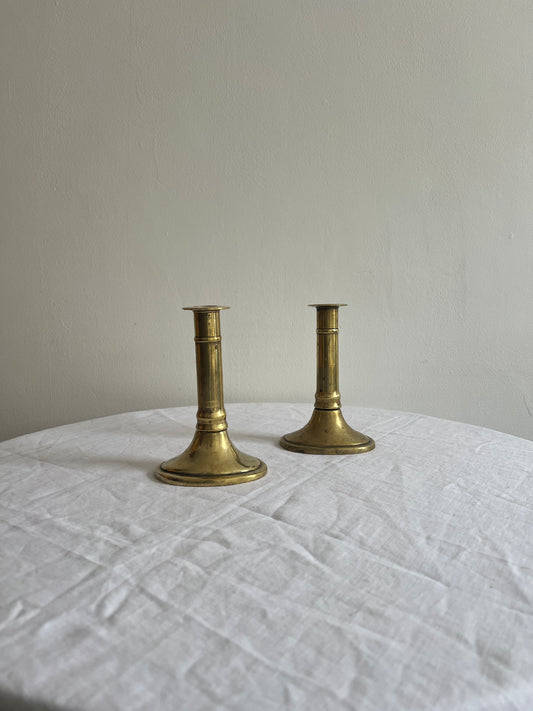 Pair of English polished brass candle sticks
