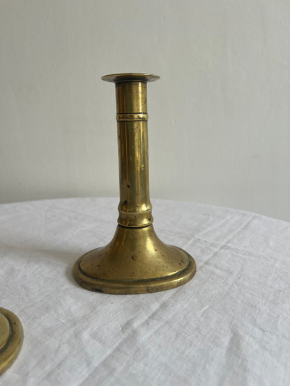 Pair of English polished brass candle sticks