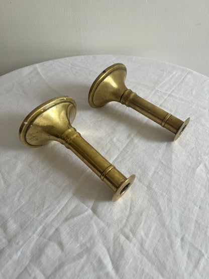 Pair of English polished brass candle sticks