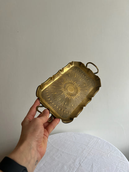 Vintage brass small sunburst tray with a wavy edge and ball feet