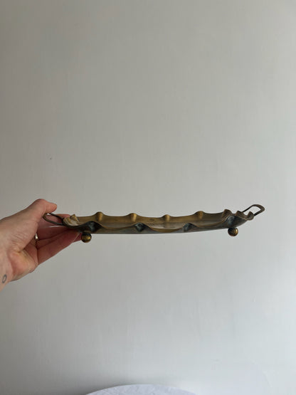 Vintage brass small sunburst tray with a wavy edge and ball feet