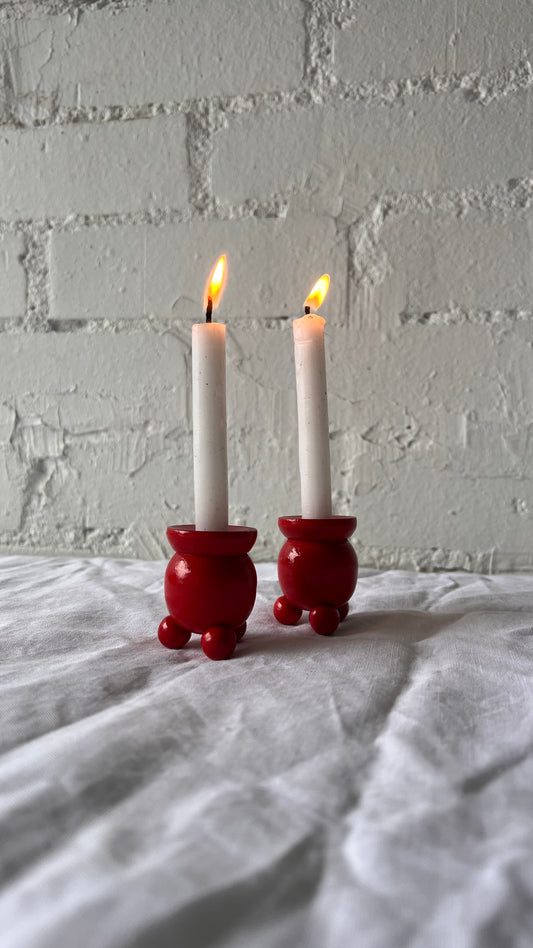 PAIR OF BALL FEET RED CANDLE HOLDERS