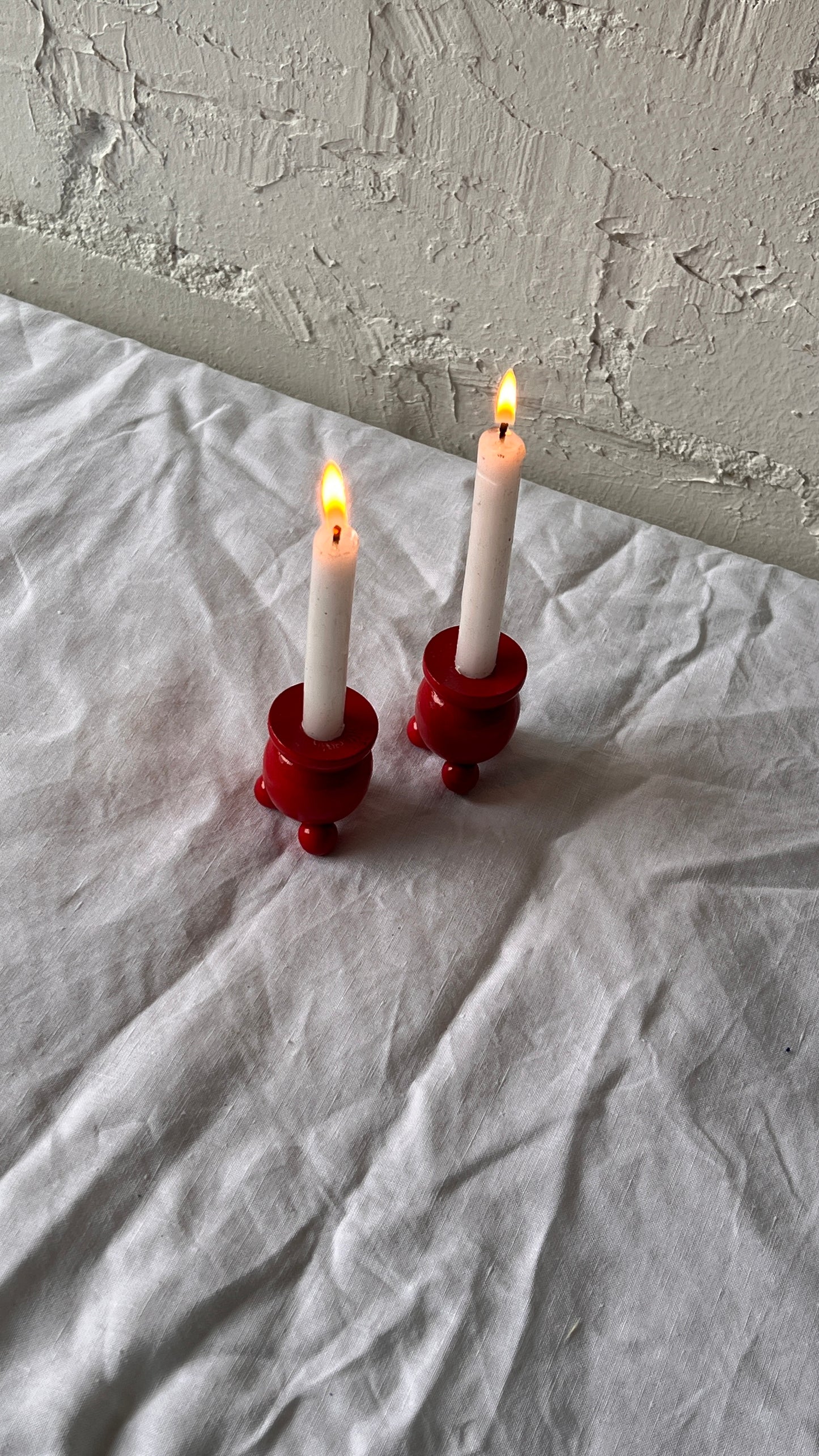 PAIR OF BALL FEET RED CANDLE HOLDERS