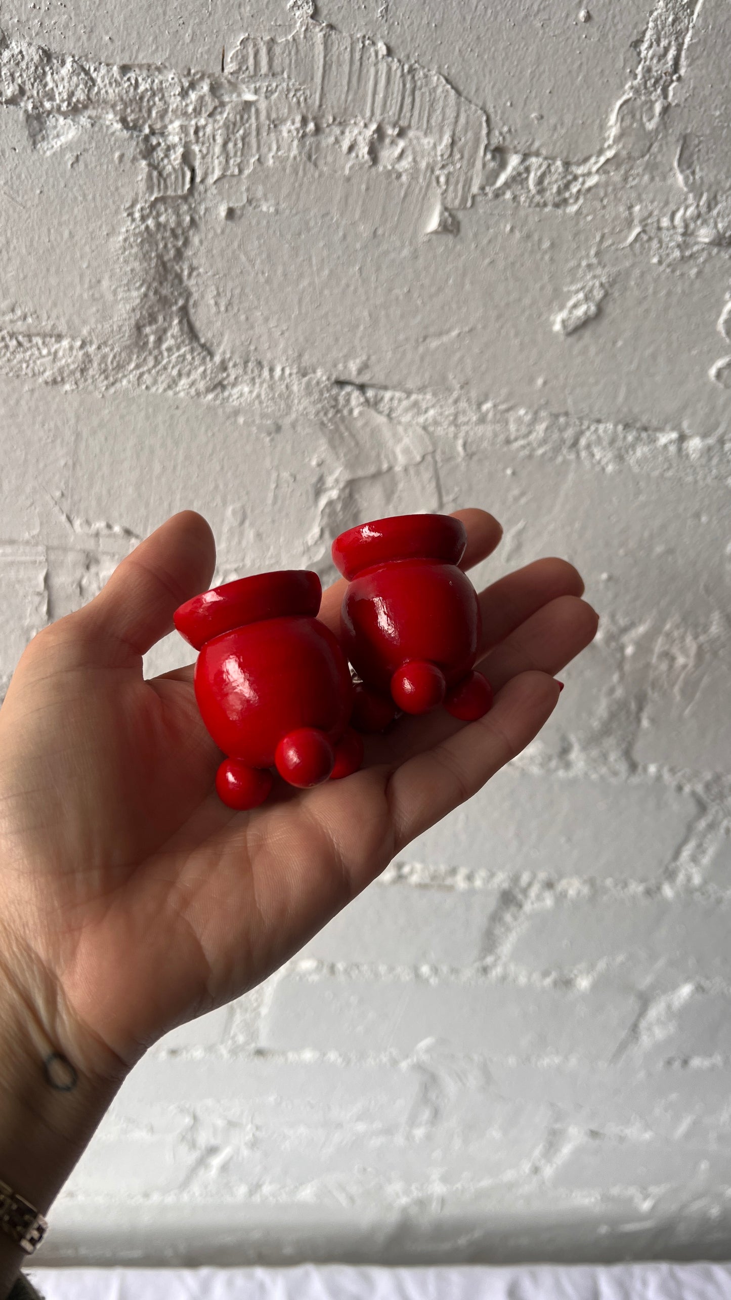 PAIR OF BALL FEET RED CANDLE HOLDERS