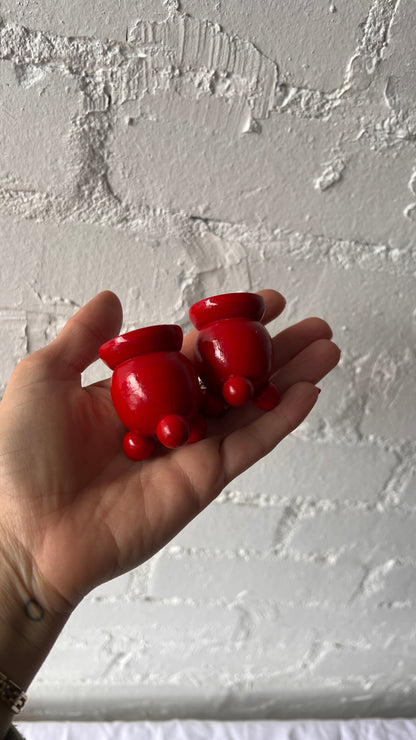 PAIR OF BALL FEET RED CANDLE HOLDERS