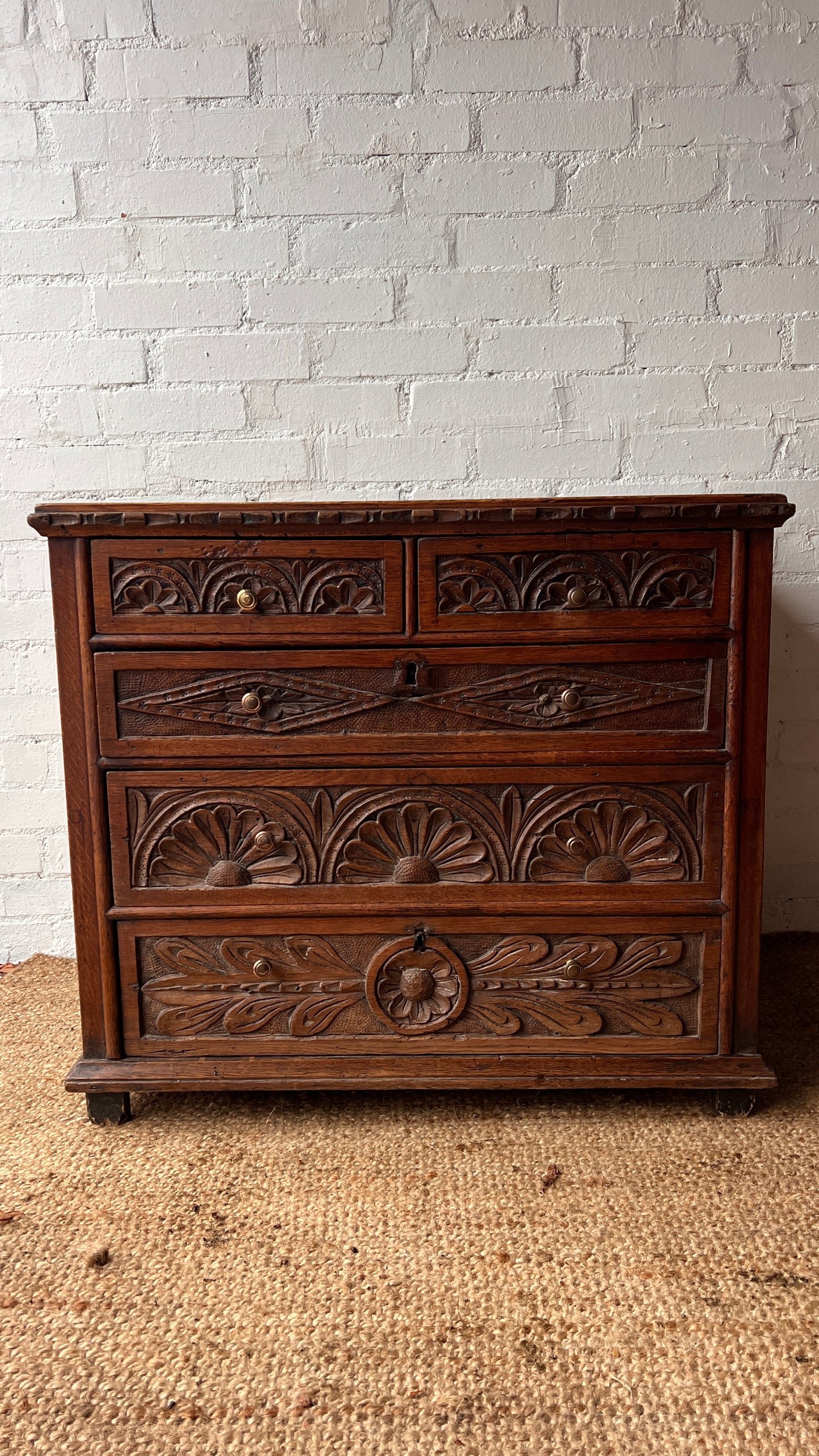 ANTIQUE CARVED CHEST OF DRAWERS