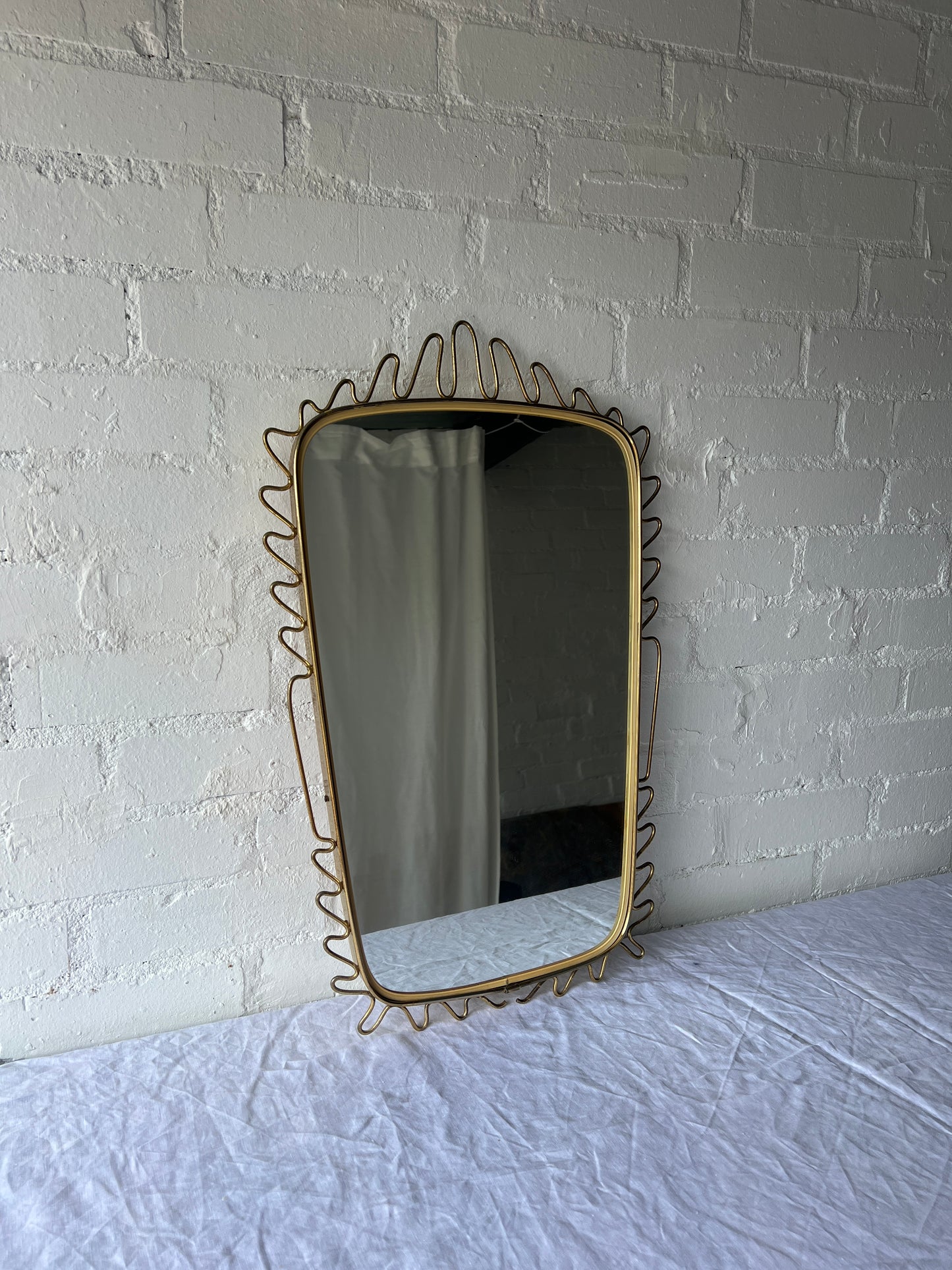 BRASS WIGGLE MIRROR