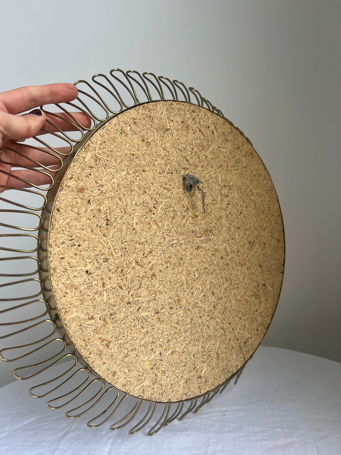 Circular brass convex mirror in the style of Josef Frank