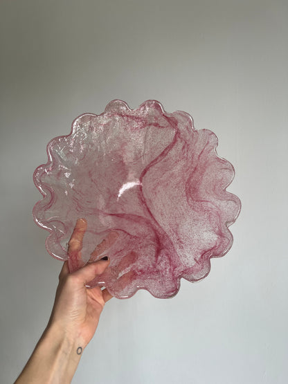 Large glass scalloped edge bowl with pink marbling
